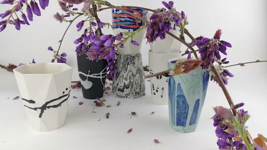 Video of a group of porcelain pieces with wisteria