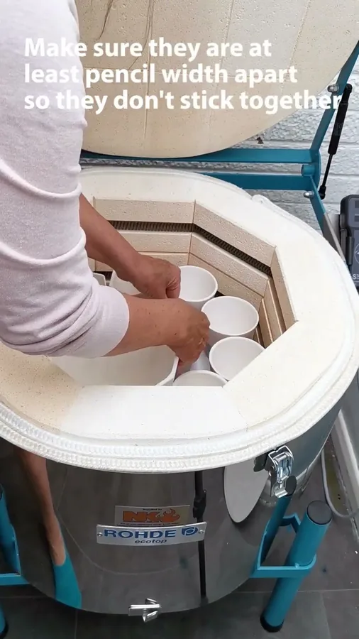Video of cups spaced out in the kiln before firing